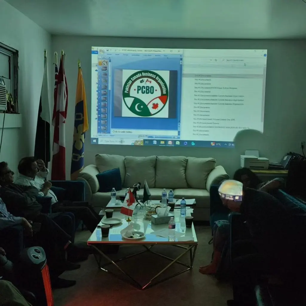 The PCBO seal projected on a screen during the meeting